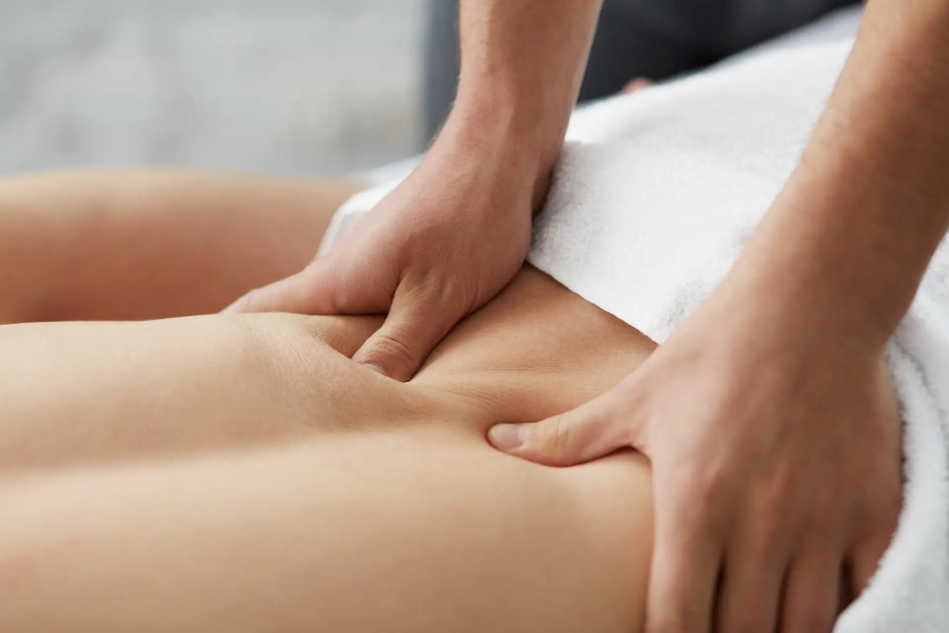 Massage therapist providing a professional massage treatment
